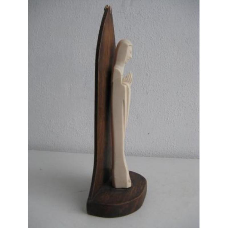 kleine madonna c op houten console