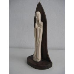 kleine madonna c op houten console