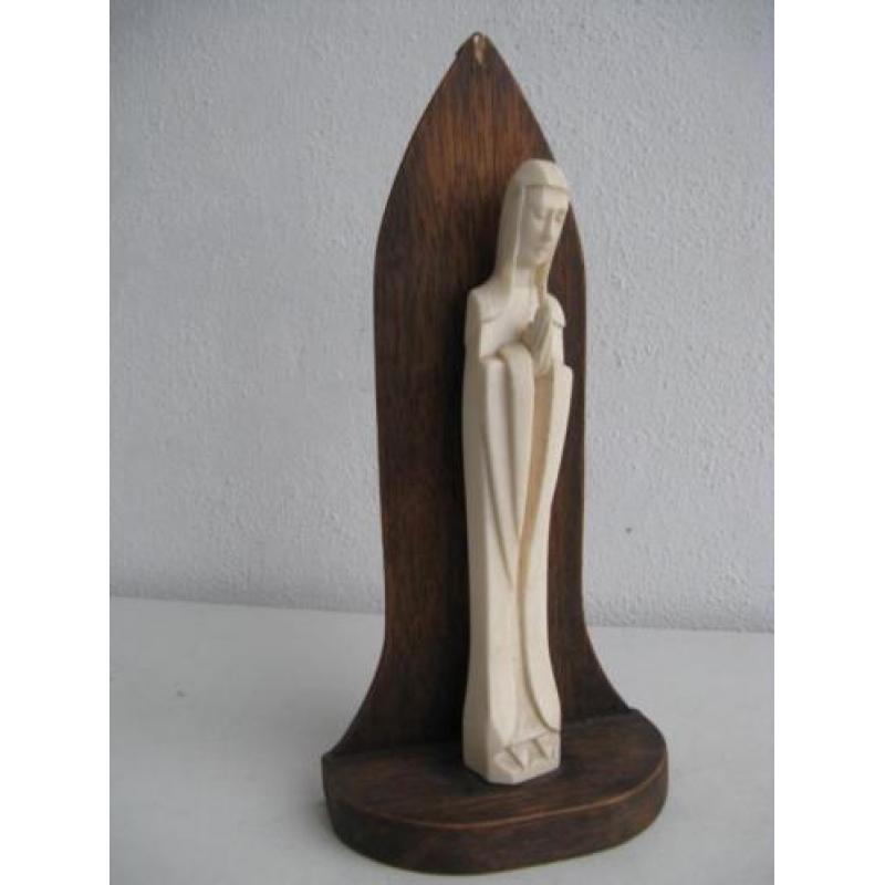 kleine madonna c op houten console